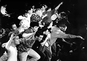 Images Dated 4th May 1991: Special Beat singer Rankin Roger(striped shirt) on stage at the Tic Toc club in Coventry