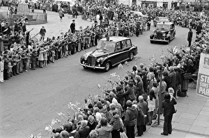 Spectators await Queen Elizabeth II and Prince Philip, Duke of Edinburgh in Eston during Spectators await Queen Elizabeth II and Prince Philip, Duke of Edinburgh in Eston during