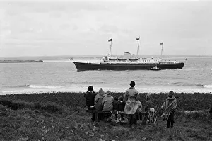 Spectators await the Royal Yacht during the Queens visit to Teesside Silver Jubilee tour Spectators await the Royal Yacht during the Queens visit to Teesside Silver Jubilee tour