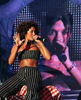 Images Dated 4th April 1998: Spice Girls Mel B singing on stage during their concert at Glasgow SECC April 1998