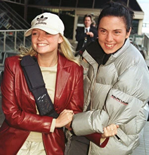 Images Dated 15th November 1998: Spice Girls Singers Emma Bunton and Mel C November 1998 leave Heathrow Airport for
