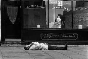 Spike Milligan comedian March 1963 prostate outside an Islington undertakers Spike Milligan comedian March 1963 prostate outside an Islington undertakers