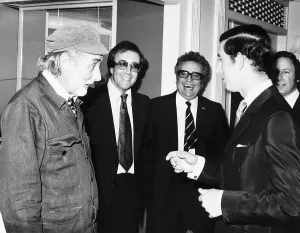 Spike Milligan with fellow Goon members minus Michael Bentine meet Prince Charles at a Spike Milligan with fellow Goon members minus Michael Bentine meet Prince Charles at a