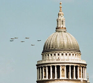 Spitfires and Hurricanes seen here passing the dome of St Paul'