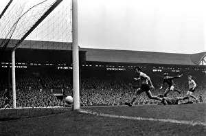 Sport: Football: Liverpool v. Southampton. Emlyn Hughes jumps over fallen goal keeper Sport: Football: Liverpool v. Southampton. Emlyn Hughes jumps over fallen goal keeper
