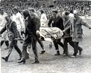 Sport - Rugby - Swansea v Pontypool - Swansea and Wales No 8 Mervyn Davies is carried of Sport - Rugby - Swansea v Pontypool - Swansea and Wales No 8 Mervyn Davies is carried of