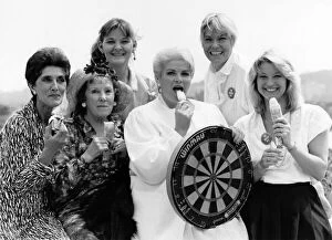 Images Dated 7th July 1987: Stars of the BBC soap Eastenders cool off with ice-creams in the heat during a visit to