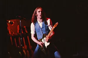 Images Dated 18th March 1981: Status Quo, English rock band, onstage in 1981. Picture shows lead singer