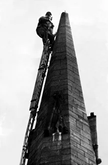 A steeplejack repairing a chuch spire on 2nd May 1968 A steeplejack repairing a chuch spire on 2nd May 1968