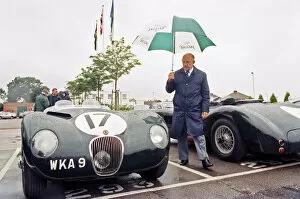 Images Dated 16th June 1993: Sterling Moss with a C-Type Jaguar which he piloted to Le Mans 40 years ago