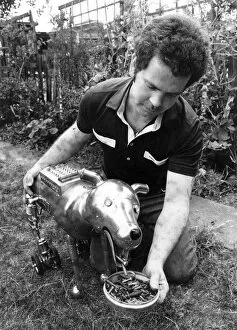Steve Brooks of East London with his electric robot dog. August 1981 P018808