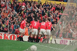 Images Dated 10th April 1993: Steve Bruce, surrounded by his ecstatic team mates celebrates his 96th minute winner for