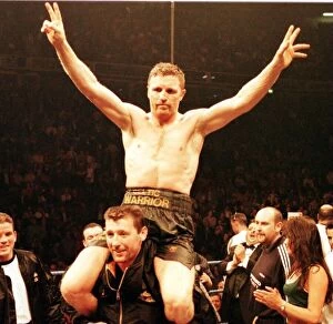 Images Dated 9th November 1996: Steve Collins celebrates after beating Nigel Benn in the WBO middleweight fight in