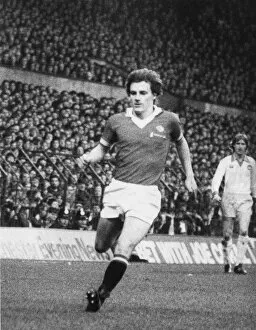 Images Dated 27th November 1976: Steve Coppell, Manchester United player in action, Old Trafford