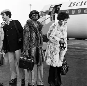 Stevie Wonder arriving at London Airport with Yvonne Wright. 24th January 1974 Stevie Wonder arriving at London Airport with Yvonne Wright. 24th January 1974