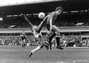 At full stretch, Birmingham City's Howard Gayle makes an acrobatic attempt to find a At full stretch, Birmingham City's Howard Gayle makes an acrobatic attempt to find a