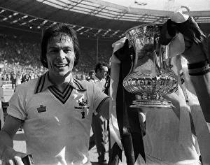 Stuart Pearson of West Ham holds the FA Cup after West Ham had beaten Arsenal in Stuart Pearson of West Ham holds the FA Cup after West Ham had beaten Arsenal in