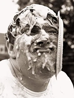 Stunts comedian Johnny Kay gets custard pie in face attemping the world record of 500 Stunts comedian Johnny Kay gets custard pie in face attemping the world record of 500