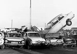Images Dated 7th January 1980: Stunts Stunt woman Jacquie Creedy crashes her car after trying to jump a number of cars