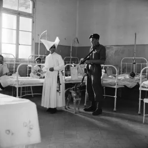 Suez Crisis 1956 Royal Marine Andrew Hall accompanies Sister Mary Joseph on her Suez Crisis 1956 Royal Marine Andrew Hall accompanies Sister Mary Joseph on her