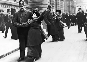 Suffragettes Under Arrest May 1906 Pictured being escorted by Policemen in London Suffragettes Under Arrest May 1906 Pictured being escorted by Policemen in London