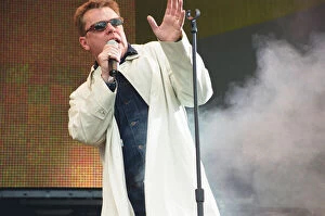 Images Dated 4th July 1999: Suggs, lead singer of British ska group Madness, performing at Party in the Park at Hyde