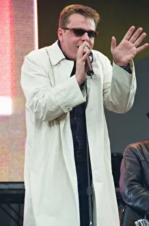 Images Dated 4th July 1999: Suggs, lead singer of British ska group Madness, performing at Party in the Park at Hyde