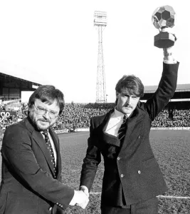 The Sun's sports writer Bob Cass congratulates David Hodgson on his Golden Ball Award The Sun's sports writer Bob Cass congratulates David Hodgson on his Golden Ball Award