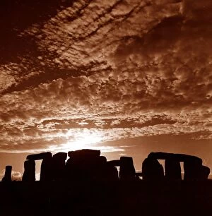 Sunset over Stonehenge in Wiltshire Britain Sunset Silhouette Clouds