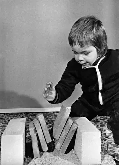 Supertot Preston Mahon shatters three bricks with a hefty blow Supertot Preston Mahon shatters three bricks with a hefty blow