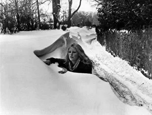 Images Dated 22nd February 1978: Susan Dibble of St Nicholas is 5ft 5in but dwarfed by drifts in Duffryn Lane, Cardiff