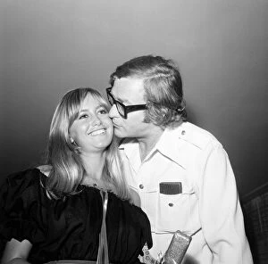 Susan George receives a kiss from Michael Caine. 26th July 1971