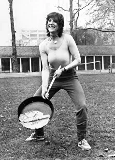 Images Dated 23rd February 1982: Suzanne Danielle in great form before taking part in a pancake race, 23rd February 1982