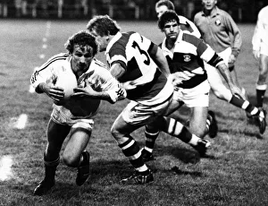 Swansea scrum half Alan Williams gets away from Pontypool's Graham Price. Circa 1989 Swansea scrum half Alan Williams gets away from Pontypool's Graham Price. Circa 1989