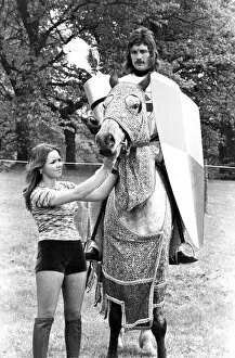Sylvia Armstrong, aged 18, of Great Lumley, holds the horse for David Mould before he