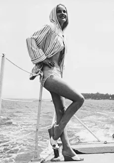 Boots And Shoes Gallery: Sylvia Syms Actress on a boat at sea May 1959