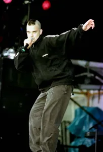 T in the Park Robbie Williams on stage singing July 1998 T in the Park Robbie Williams on stage singing July 1998