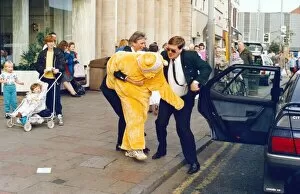 Images Dated 2nd October 1991: Where are they taking him? left - a tearful Ann Burridge, four