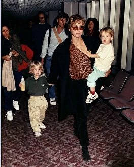 Tatum O Neal wife of Tennis star John McEnroe with her children Kevin