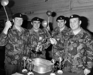A team of three cooks and a driver from the 82 Ordnance company (V A team of three cooks and a driver from the 82 Ordnance company (V