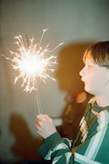 Images Dated 28th October 1994: Teenage boy with Fireworks, 28th October 1994