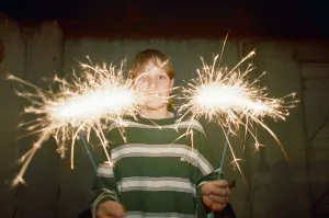 Images Dated 28th October 1994: Teenage boy with Fireworks, 28th October 1994