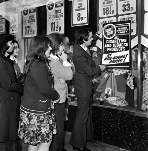 Images Dated 15th April 1975: Tesco supervisor Tony Dobbin puts up pre-budget prices'