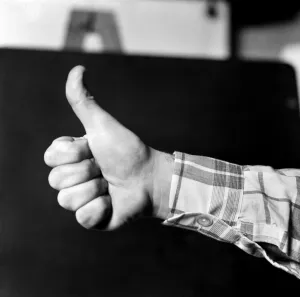 Thumbs up. Mans hand. January 1975 75-00146-002 Thumbs up. Mans hand. January 1975 75-00146-002