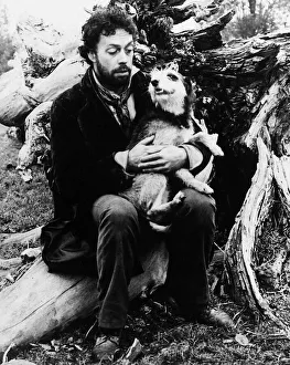 Tim Curry actor plays Bill Sykes with dog Bullseye, March 1982 Tim Curry actor plays Bill Sykes with dog Bullseye, March 1982