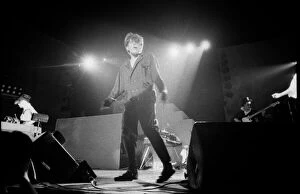 Tom Bailey of the British pop group The Thompson Twins performing on stage during a