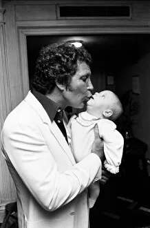 Images Dated 3rd September 1983: Tom Jones with his grandson Alexander, aged eleven months, in their London hotel