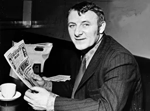 Tommy Docherty Scotland manager reading Daily Record newspaper. 1971 Tommy Docherty Scotland manager reading Daily Record newspaper. 1971