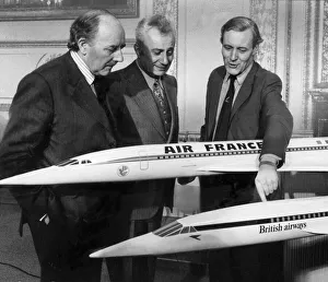 Tony Benn with Marcel Cavaille and Lord Beswick with models of Concorde during its Tony Benn with Marcel Cavaille and Lord Beswick with models of Concorde during its