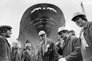 Images Dated 10th April 1979: Tony Benn MP seen here enjoying a joke during his visit to Smiths Ship Repair Yard in